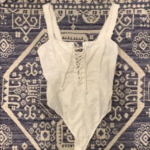 FREE PEOPLE LACE UP BODY SUIT